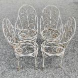 A set of four wrought iron Victorian conservatory chairs with scrolling armsThe chairs are solid and