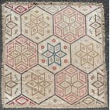 A Victorian patchwork quilt with hexagonal panels the centre panel embroidered with 1890 F B 1893