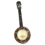 An early 20th century zither banjo inlaid with mother of pearl length 57.5cm.