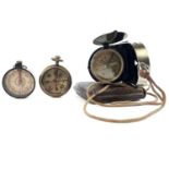 An early 20th century Bezard Kompass with leather case together with two other 20th century