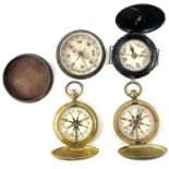 An early 20th century brass compass with cover, together with three other compasses. (4)