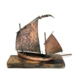 Mark PENROSE (XX-XXI) Copper model of a lugger on a wood base, height 30cm length 35cm.