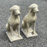 A pair of reconstituted church stone models of Pointers, height 76103cm.