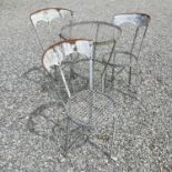 An early 20th-century French cafe set comprising three galvanized chairs and a table, 46cm