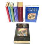 J. K. ROWLING. (b.1965 -). A Full Set of First Deluxe Edition Harry Potter Novels. Bloomsbury,