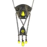 A base metal and yellow stone set German pendant necklace.