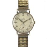 A Smiths Deluxe 9ct gold 1940's gentleman's wristwatch.