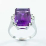 An 18ct white gold amethyst and diamond dress ring,