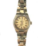 An Omega Automatic Cosmic 2000 ladies gold plated bracelet wristwatch.