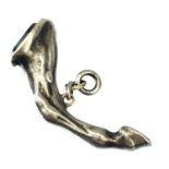 A silver seal fob and pipe tamper in the form of a horses leg.