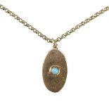 A 9ct gold pendant necklace, set with a circular turquoise, on a belcher necklace.