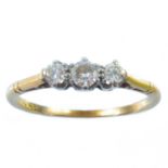 An 18ct gold diamond set three stone ring.