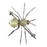 A Victorian silver gem set spider brooch.