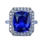 An 18ct white gold tanzanite and diamond cluster ring,