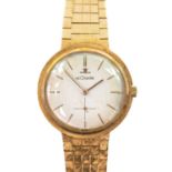 A Le Coultre 14k gold gentleman's manual wind bracelet wristwatch.