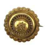 A Victorian 15ct hallmarked gold circular target brooch.