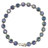 A 10ct gold mystic topaz set bracelet,