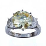 An impressive 4.80ct V S2 fancy light yellow diamond solitaire ring.