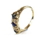 An early 20th century 18ct diamond and sapphire seven stone ring,