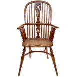 An attractive yew wood Windsor armchair, 20th century, seat impressed 'R E Ley'.
