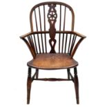 An ash and elm wheelback windsor armchair, 19th century.