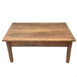 A walnut centre table, early 19th century, reduced and converted to a coffee table.