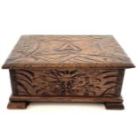 A carved oak work box, circa 1900-1920,