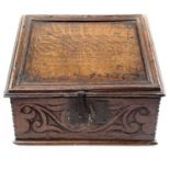 A carved oak bible box, 17th century.