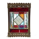 A Victorian stained glass and brass hanging lantern.