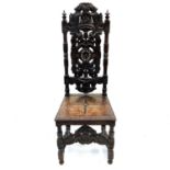 A carved oak high back hall chair,19th century.