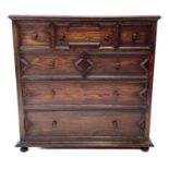 A Jacobean style oak chest of drawers, 20th century.