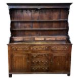 A George III oak Welsh dresser.