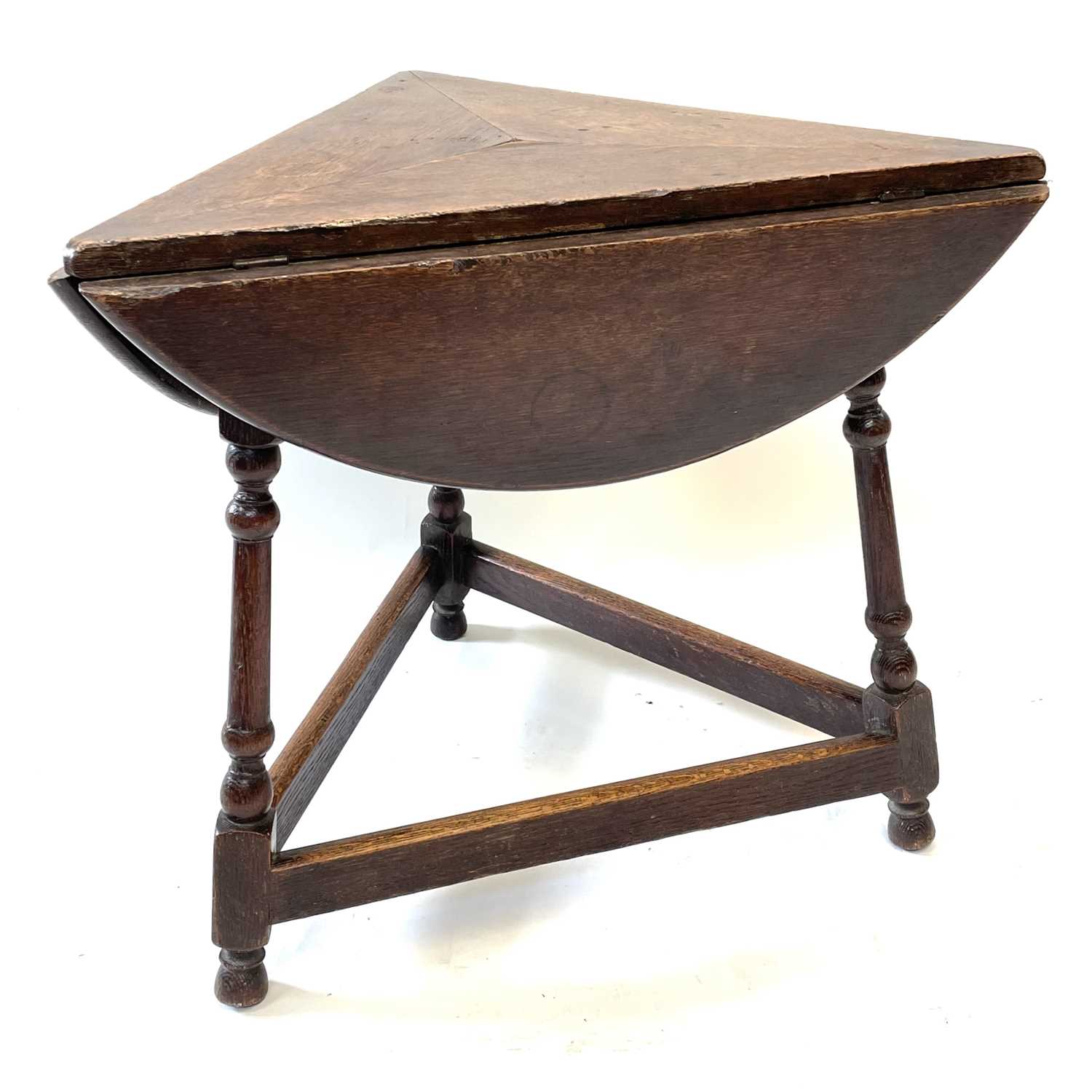 An oak drop leaf occasional table, early 20th century, of triangular form. - Image 5 of 5