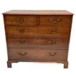 A George III oak chest of drawers.