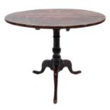 A George III oak tripod table.