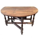 An oak gateleg dining table, late 17th/early 18th century.