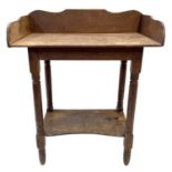 A Victorian oak washstand.