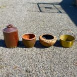 A large cylindrical stoneware storage flagon, height 50cm together with two planters and a heavy