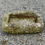 A rectangular granite trough, height 22cm width 64cm depth 43cm .