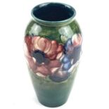 William Moorcroft, anemone pattern vase, of baluster form, circa 1930, tube-lined and painted with