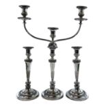 Old Sheffield plate. A Candelabrum and a pair of candlesticks . Early 19th century, of neo-classical