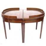 A mahogany ship's dining table, comprising two D sections, with removable raised ends, on square