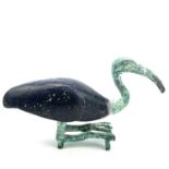 Egyptian style, after the Ptolemaic period A bronze and glass figure of a resting ibis, height 13.