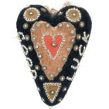 An early 20th century soldier's sweetheart heart-shaped pin cushion, the black velvet covered