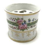 A 19th century English porcelain pen holder, of cylindrical form, with gilt and floral and wreath