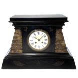A French Egyptianesque black slate and marble mantle clock, circa 1890, with engraved motifs and