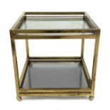 A brass and smoked glass square two-tier trolley or side table, 1970s, with square supports on