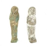 An ancient Egyptian pottery shabti possibly 1570BC-945BC with traces of glaze, length 11cm
