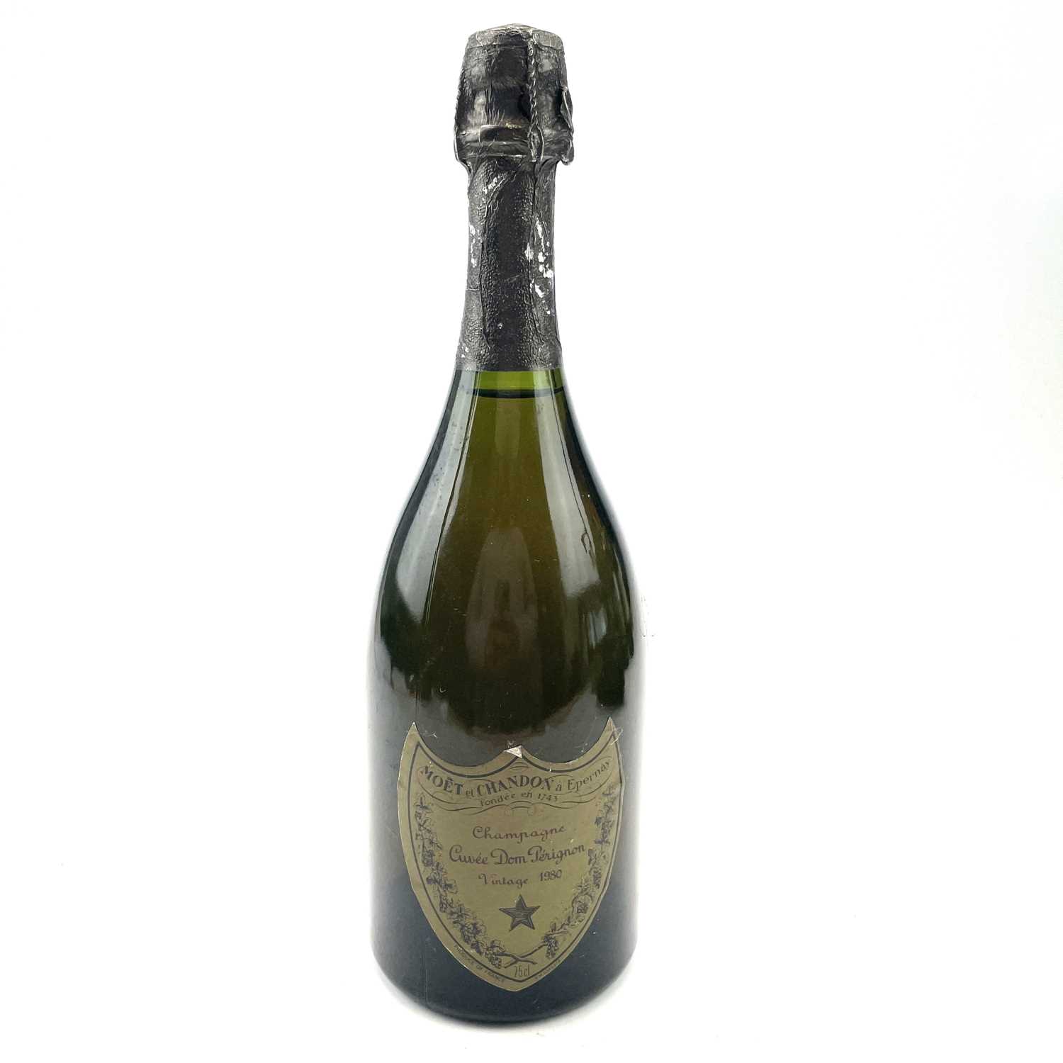 A bottle of Moet Chandon Cuvee Dom Perigion 1980 vintage champagne.