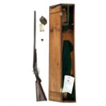 A deactivated Fred Williams double barrel 12 bore shotgun, with walnut stock, in pine case with